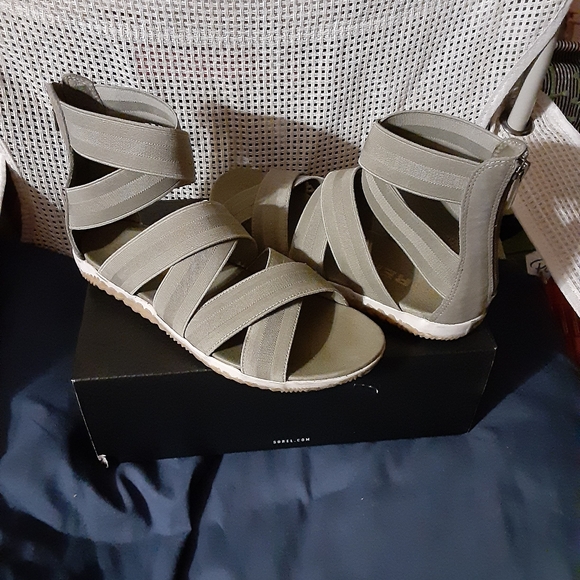 Sorel Shoes - Sorel sandals, sage or light olive colored.